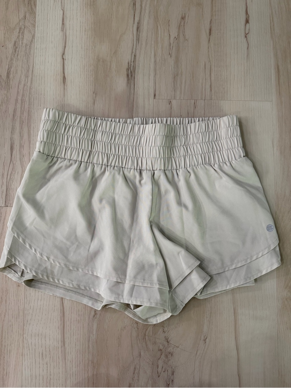 RBX Women's Athletic Smocked Waist Shorts in Light Cream